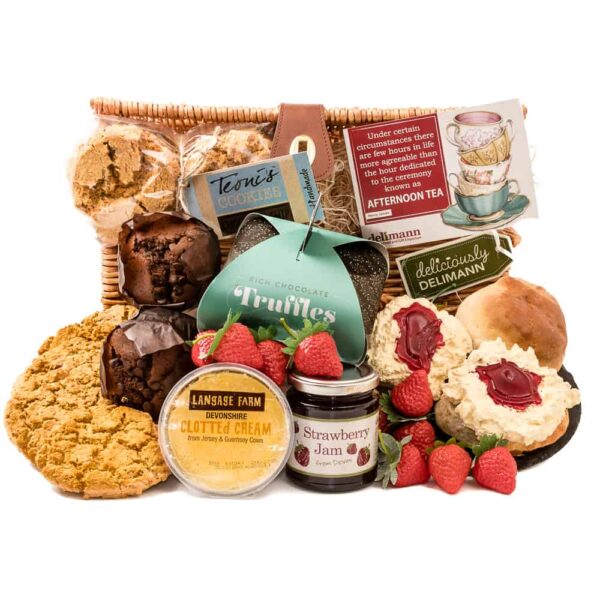 A cream tea hamper with muffins, cookies and truffles.
