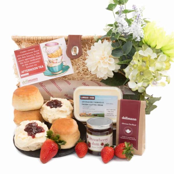 Traditional Cream tea with freshly baked scones, clotted cream, jam and tea.