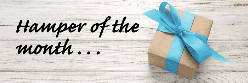A blue gift box with the words hamperer of the month.