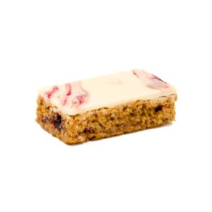A Yoghurt Topped Blackcurrant Flapjack with berries and cream.