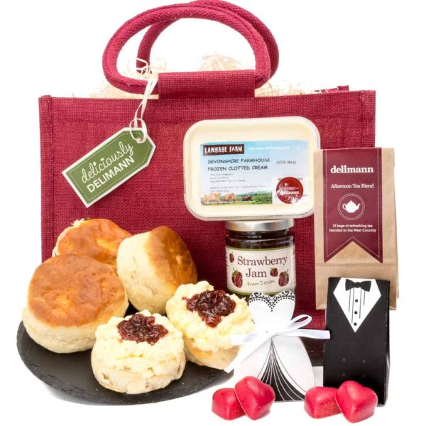 A gift bag with Congratulations Cream Tea and assorted confections.