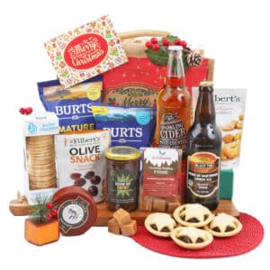 A Gluten Free Country Christmas Box featuring a variety of snacks and drinks, ideal for the holiday season.