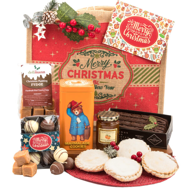 Get ready to indulge in Paddington’s Festive Favourites - a merry christmas Paddington’s Festive Favourites gift box filled with delicious cookies, biscuits, chocolate yule log, mince pies and padding tin full of marmalade cookies.