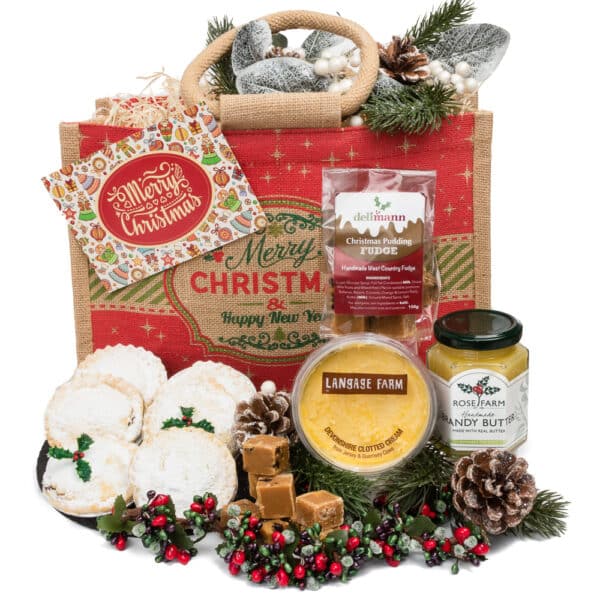 A Traditional Devon Mince Pie Hamper filled with a variety of festive goodies like mince pies, brandy butter and fudge.