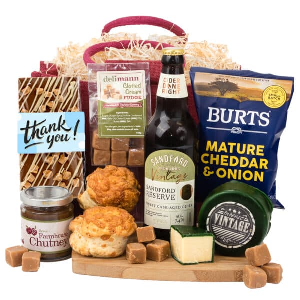 A Cheese & Nibbles Country Box gift basket with beer, cheese and biscuits.
