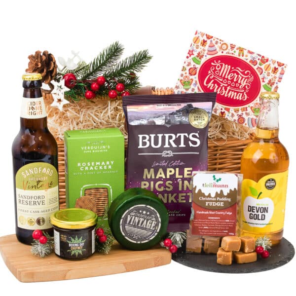 A Christmas Christmas Cider & Cheese Gift hamper with a variety of snacks and drinks.