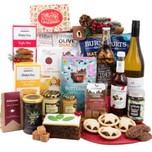 A Gluten Free Christmas Larder Box filled festive goodies. Wine, mince pies, chocolates, cookies, preserves and much more