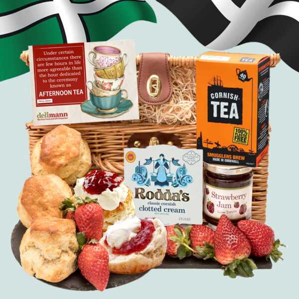 The Devon & Cornish Cream Tea features Devon scones & strawberry jam with Cornish clotted cream & Cornish tea, a quote about afternoon tea, and crossed Cornish and Devon flags in the background.