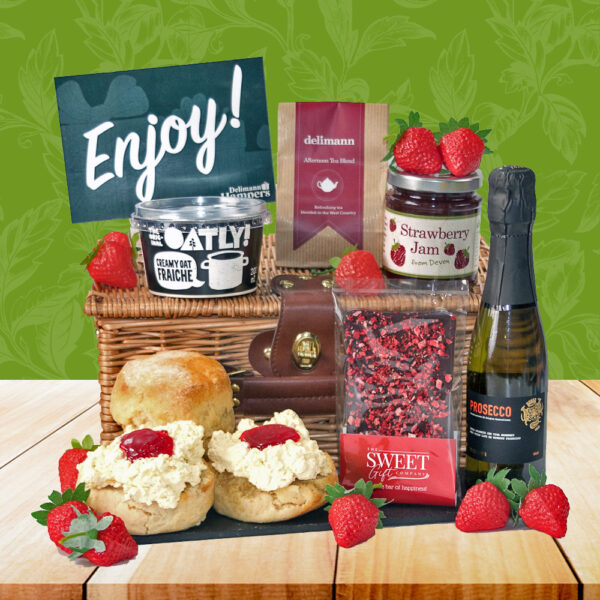 The Vegan Prosecco & Chocolate Cream Tea includes vegan scones, vegan oat cream, strawberry jam, tea, a handmade strawberry dark chocolate bar and a mini bottle of prosecco.